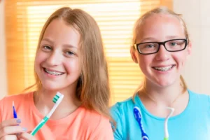 Smiling Kids Practicing Good Oral Care